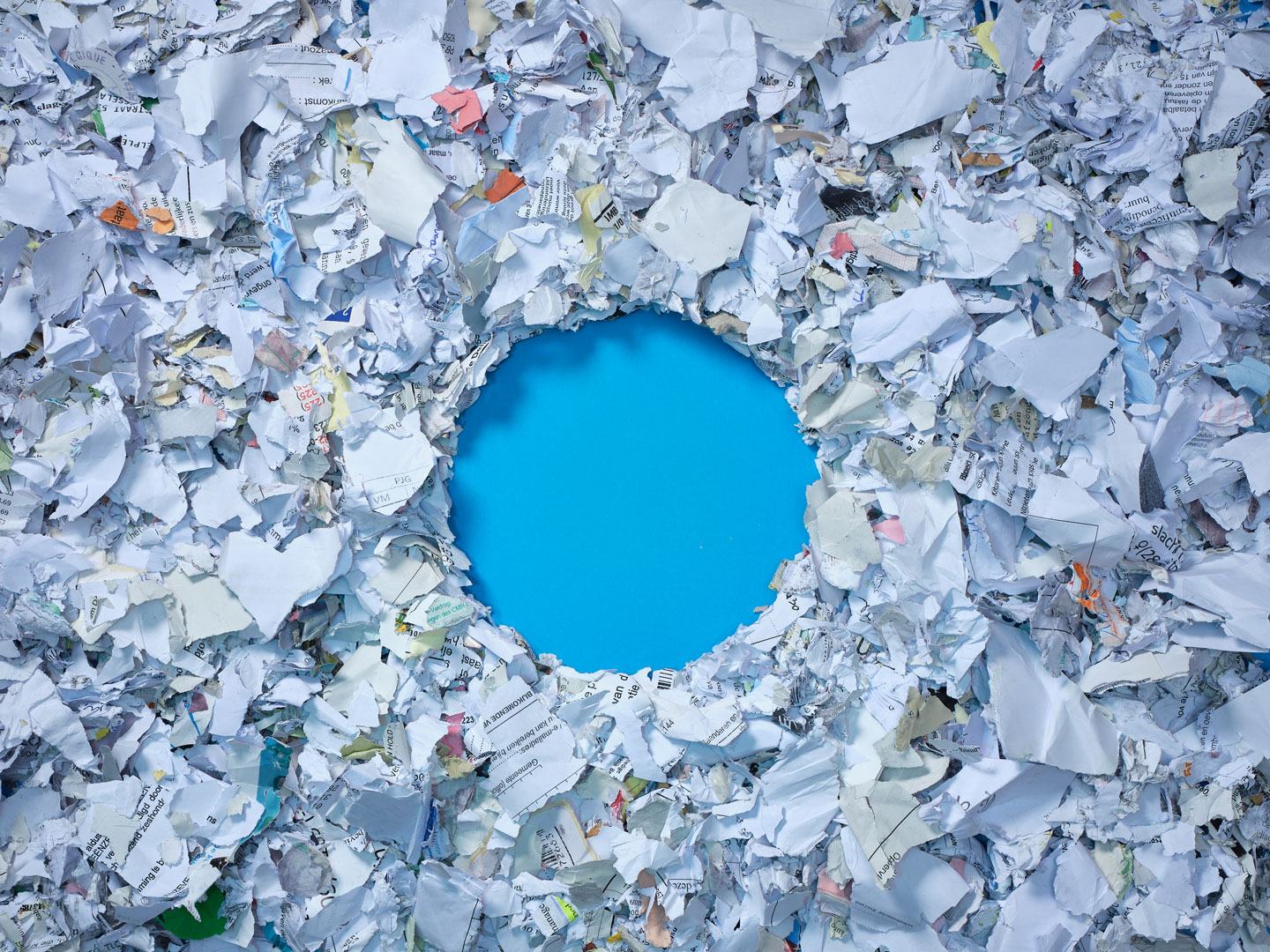 Shredded paper, artfully arranged in Renewi secondary materials photoshoot